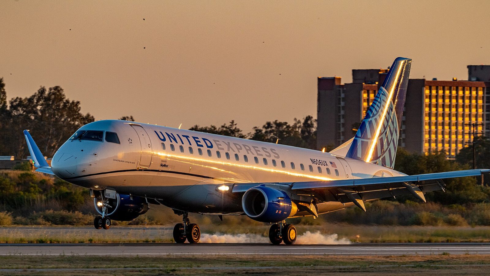 An airliner landing at Santa Barbara at dusk. The airport operates as an enterprise fund separate from the city's general fund.