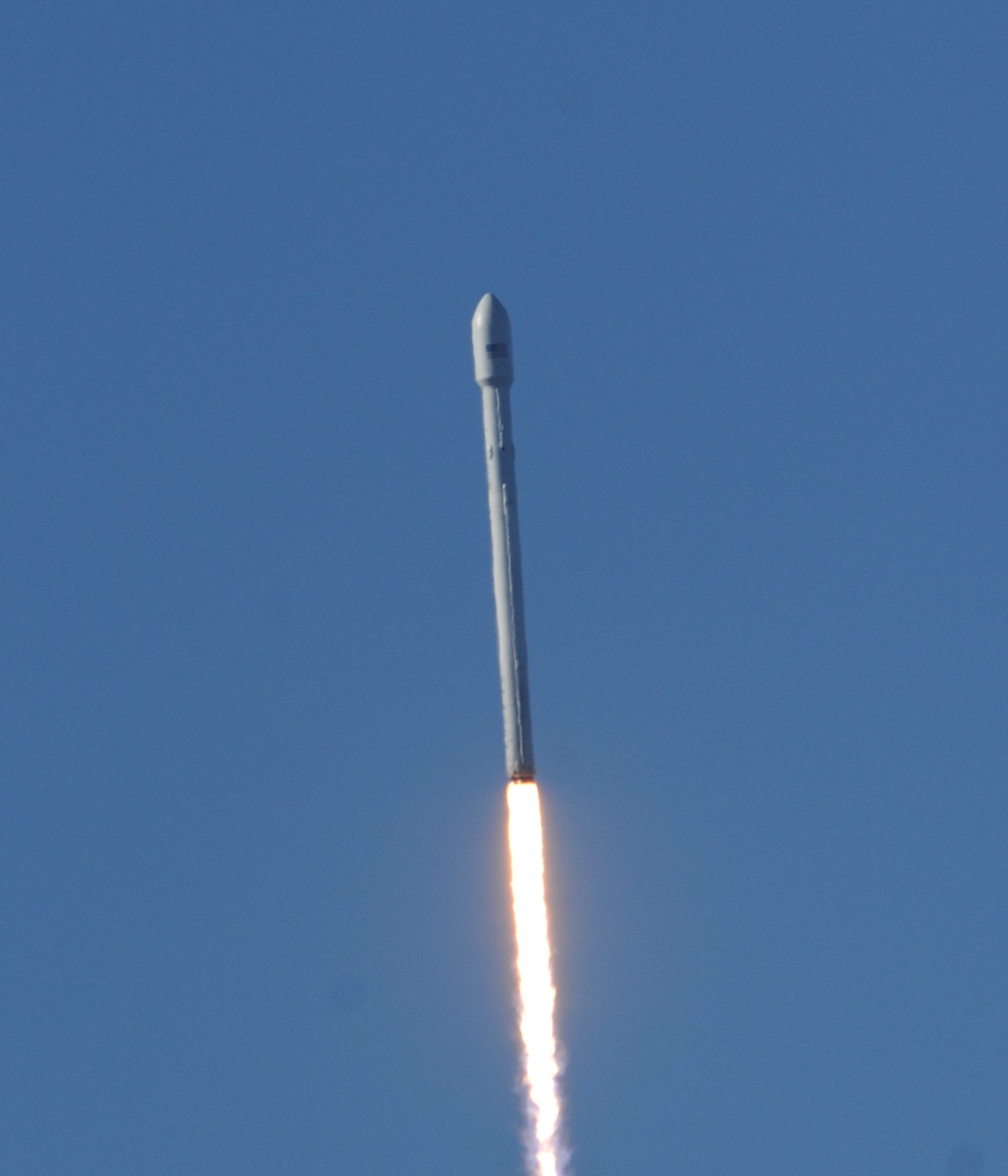 A Falcon 9 climbs over Vandenberg during the base's first SpaceX launch in September 2013. Monday's flight would be the fourth of nine batches in the Space Development Agency's Tranche 1 buildout.
